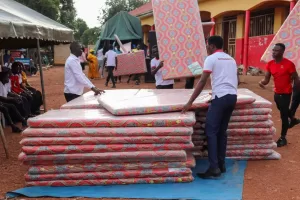 Hadijah Namyalo Uzeiye has today donated 50 mattresses and 100 blankets to Excel Vocational Institute, Luwero District